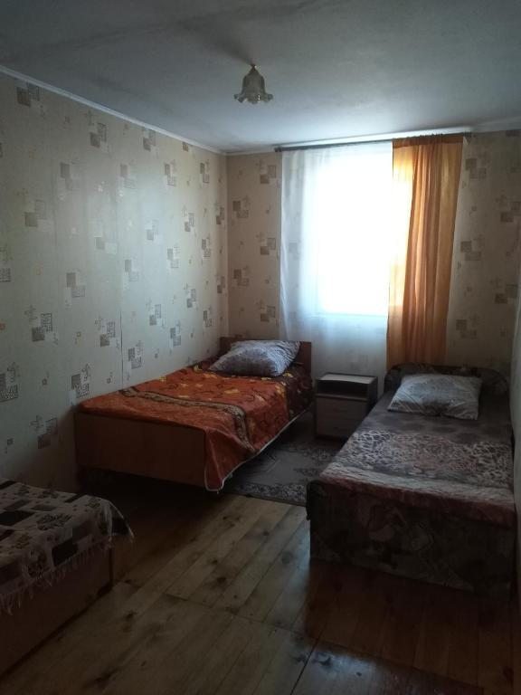 Двухместный (Двухместный номер с 2 отдельными кроватями) гостевого дома Байкальский уют, Усть-Баргузин