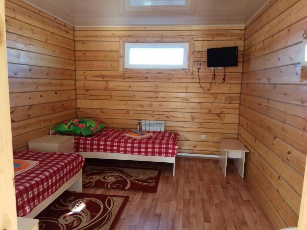 Двухместный (Двухместный номер с 2 отдельными кроватями) парк-отеля Guesthouse Baykalskie Zori, Хужир