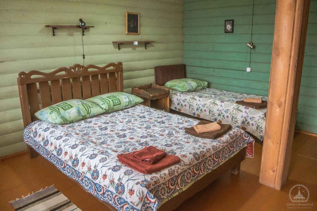 Двухместный (Улучшенный двухместный номер с 1 кроватью или 2 отдельными кроватями) отеля Усадьба Никиты Бенчарова, Хужир