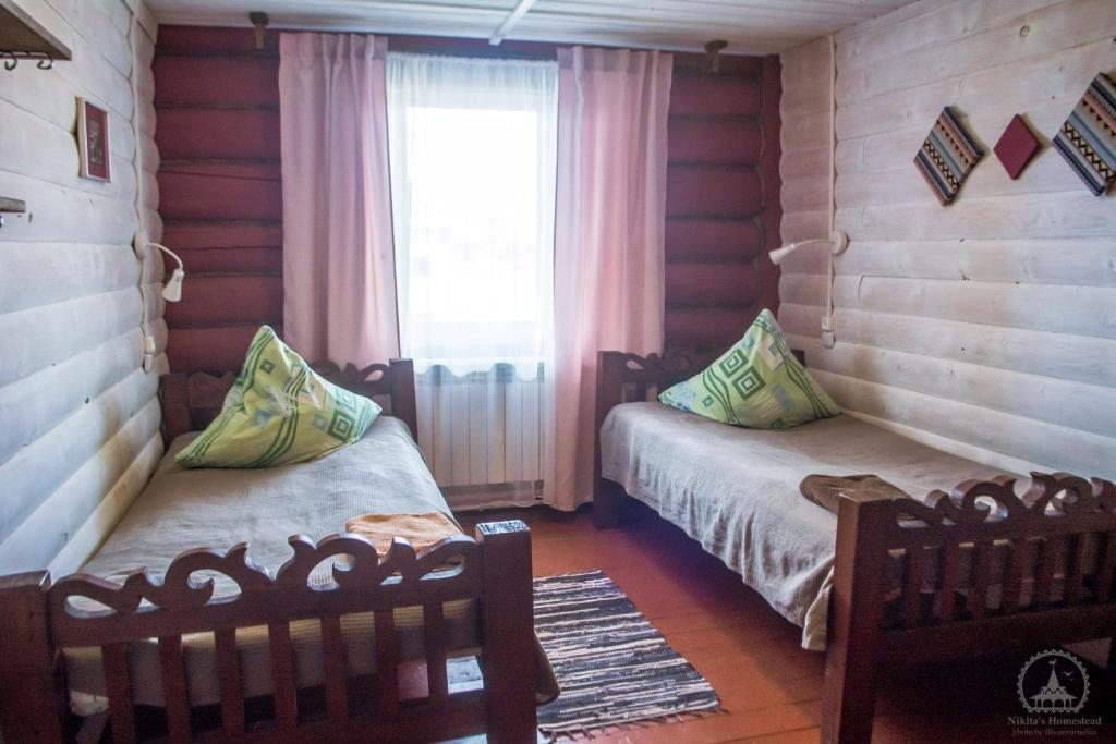 Двухместный (Бюджетный двухместный номер с 2 отдельными кроватями) отеля Усадьба Никиты Бенчарова, Хужир