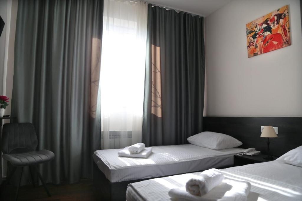 Двухместный (Стандартный двухместный номер с 2 отдельными кроватями) отеля NAVA Hotel, Ереван