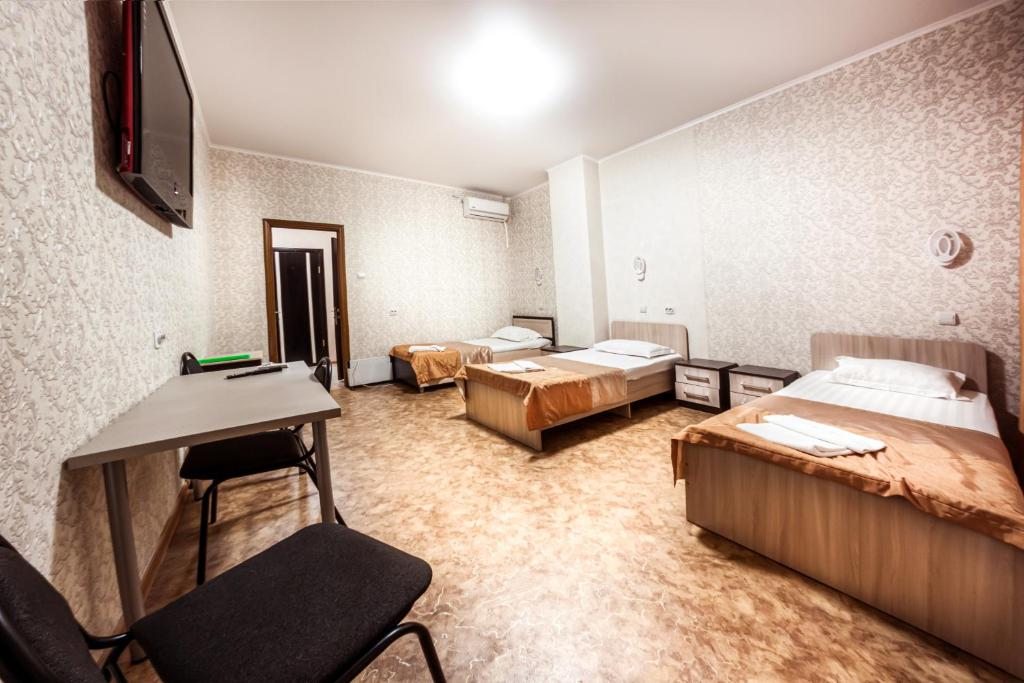 Восьмиместный (Односпальная кровать в общем номере) отеля Роял, Хабаровск