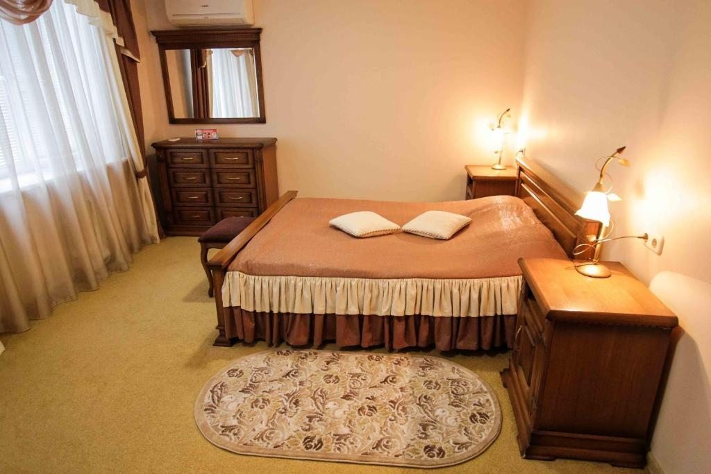 Двухместный (Двухместный номер с двуспальной кроватью и дополнительной кроватью) отеля гостиница 