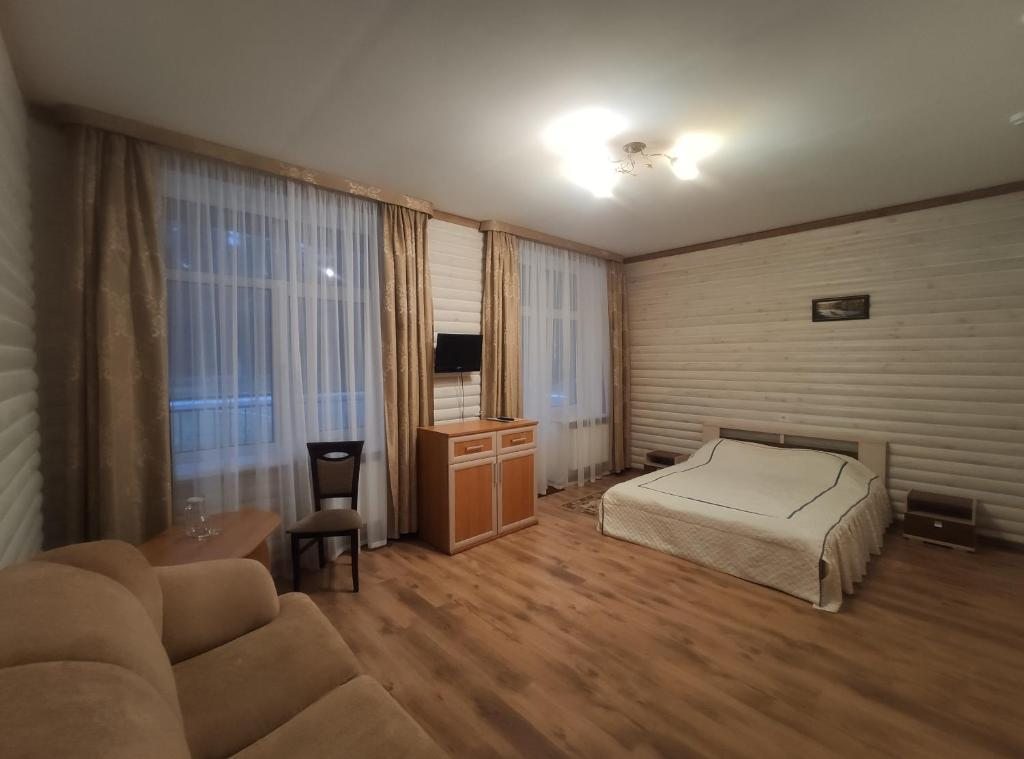 Двухместный (Стандартный двухместный номер с 1 кроватью) парк-отеля Гостиница автокемпинга Нарочь