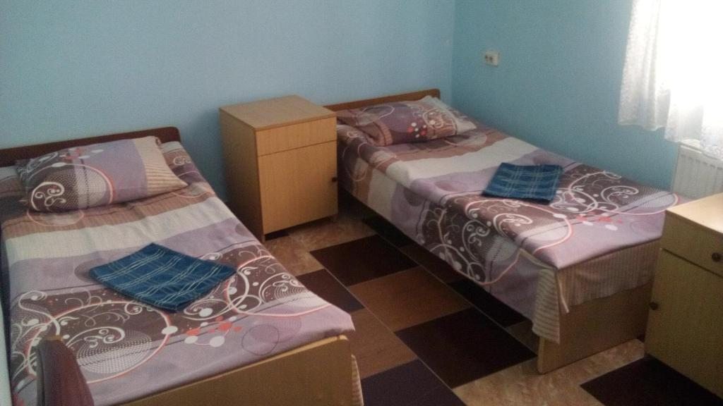Двухместный (Двухместный номер с 2 отдельными кроватями и ванной) мотеля Гостиница Околица в Ивацевичи