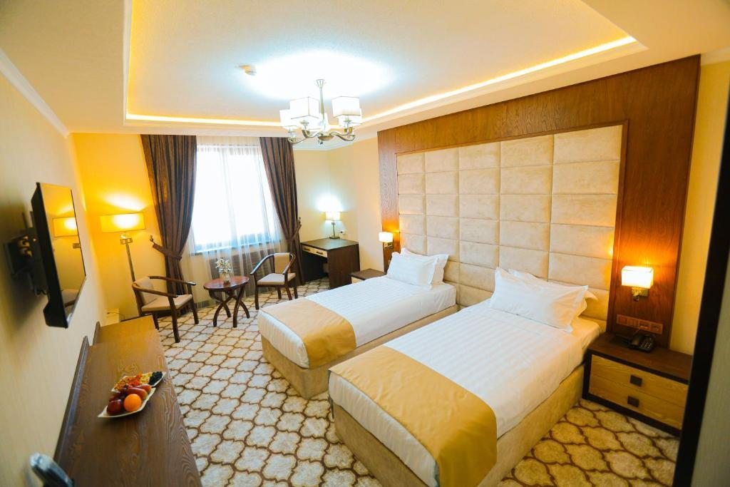 Двухместный (Стандартный двухместный номер с 2 отдельными кроватями) отеля Royal Grand Hotel, Turkistan, Туркестан