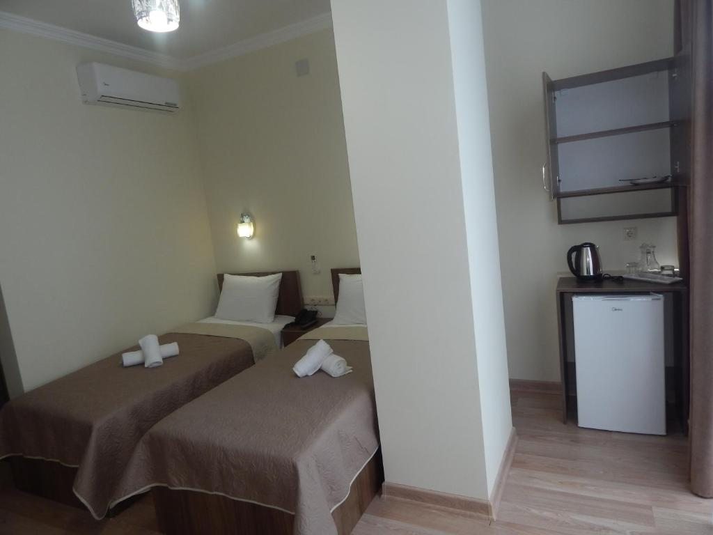 Двухместный (Двухместный номер с 2 отдельными кроватями) отеля Hotel Belugo, Батуми