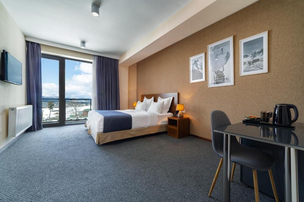 Двухместный (Стандартный двухместный номер с 1 кроватью или 2 отдельными кроватями) отеля AuRoom Bakuriani Resort, Бакуриани