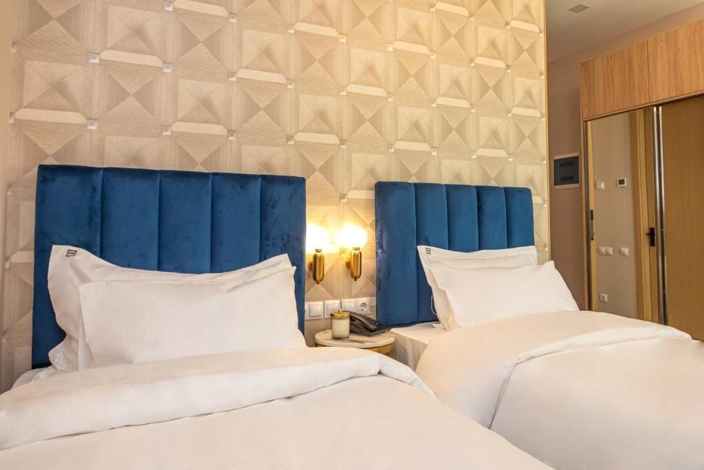 Двухместный (Стандартный двухместный номер с 2 отдельными кроватями) отеля Newport Hotel Kutaisi, Кутаиси