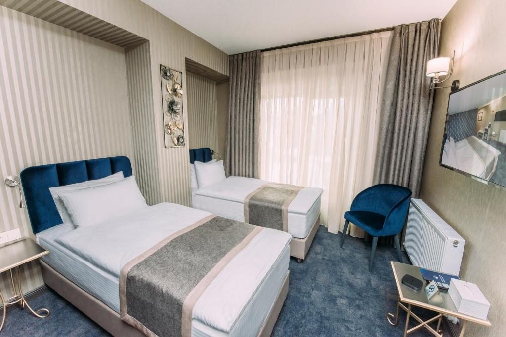 Двухместный (Двухместный номер Делюкс с 2 отдельными кроватями) отеля Sapphire Hotel & Spa Bakuriani, Бакуриани