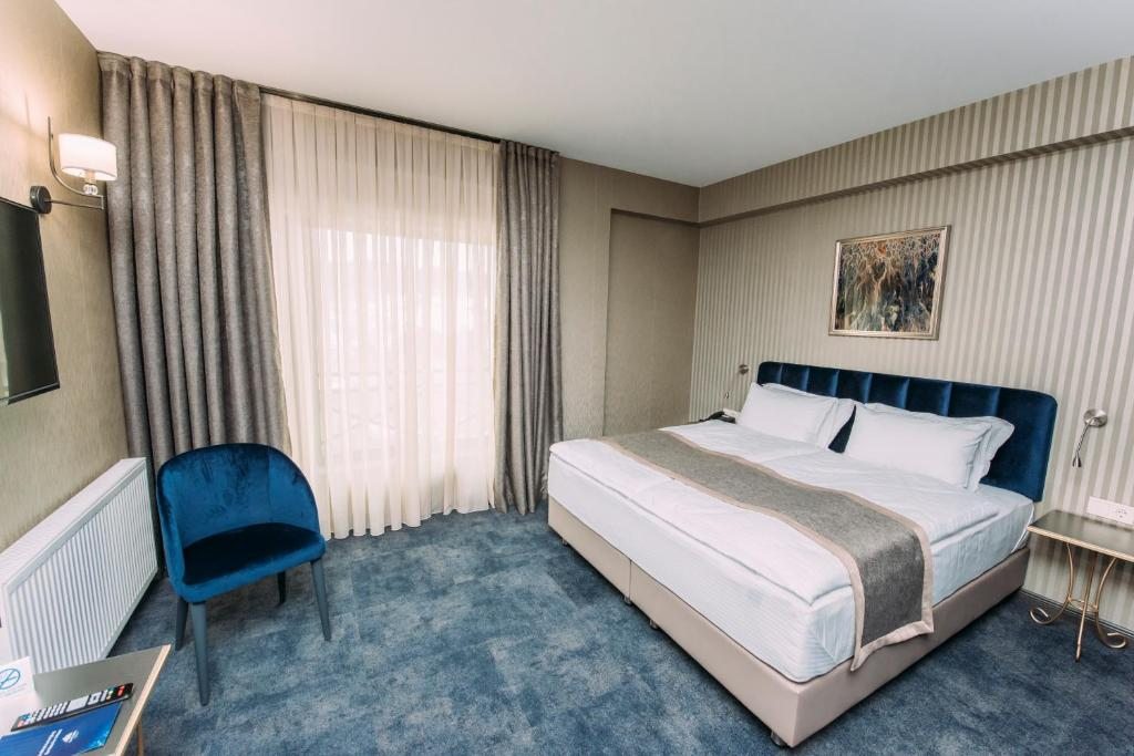 Двухместный (Номер Делюкс с кроватью размера «king-size») отеля Sapphire Hotel & Spa Bakuriani, Бакуриани