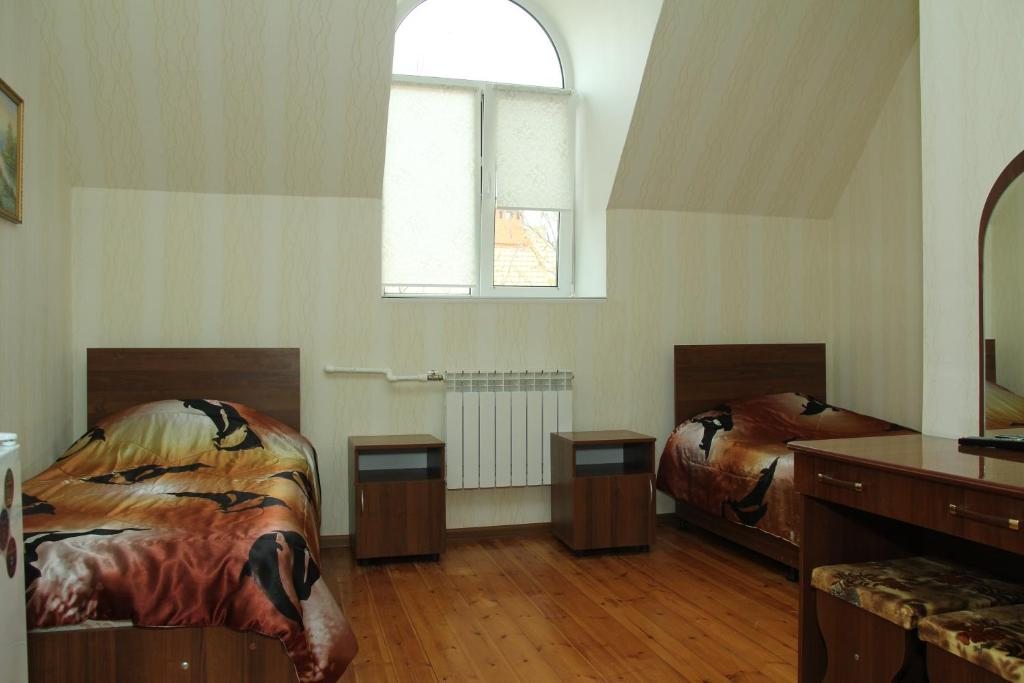 Двухместный (Просторный двухместный номер с 2 отдельными кроватями) гостиницы Оптимист, Аксай