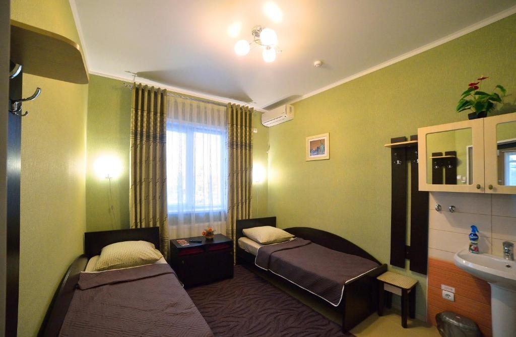 Двухместный (Бюджетный двухместный номер с 2 отдельными кроватями) гостиницы Луч, Борисоглебск