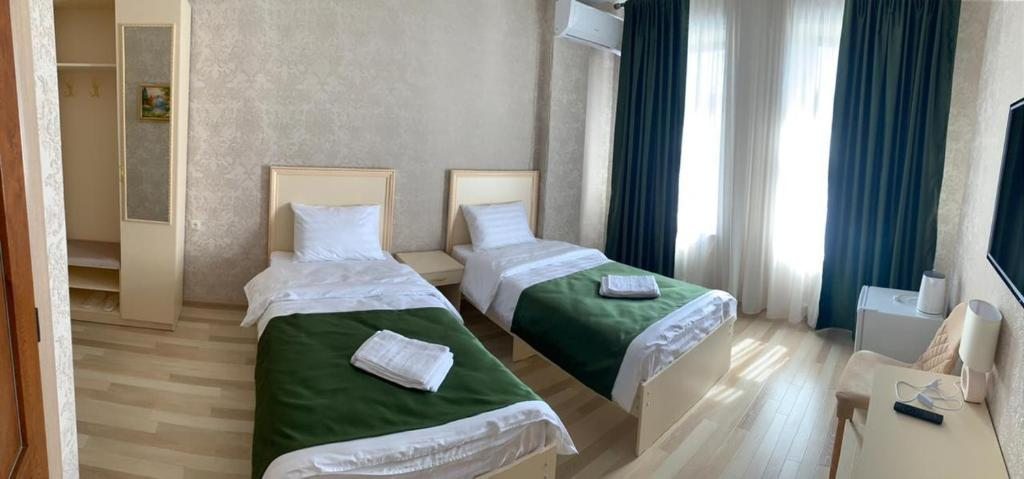 Двухместный (Большой двухместный номер с 1 кроватью или 2 отдельными кроватями) отеля Шаляпин, Каспийск