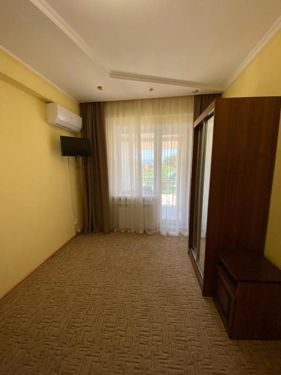 Двухместный (Двухместный номер с 1 кроватью и общей ванной комнатой), КАМЕЛИЯ