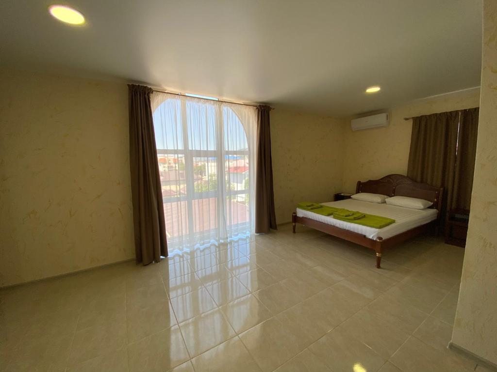 Четырехместный (Четырехместный номер Делюкс), КАМЕЛИЯ