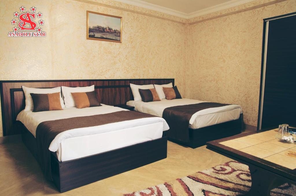 Четырехместный (Четырехместный номер Делюкс) отеля Anadolu Star Hotel & Casino, Батуми