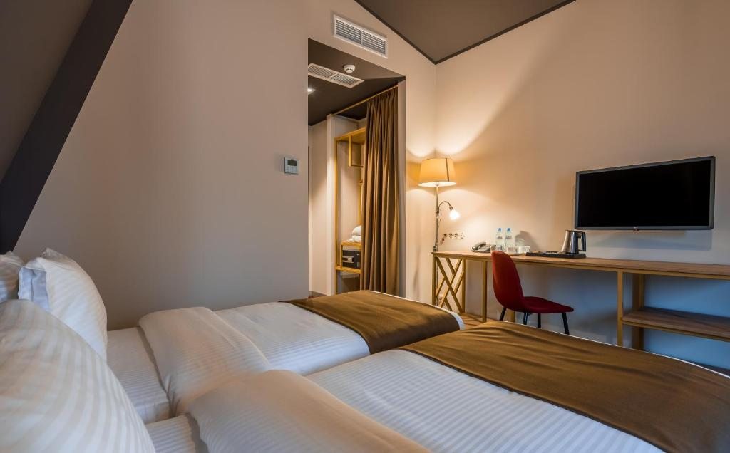 Двухместный (Стандартный двухместный номер с 1 кроватью или 2 отдельными кроватями) отеля Gladius Inn Boutique Hotel, Тбилиси