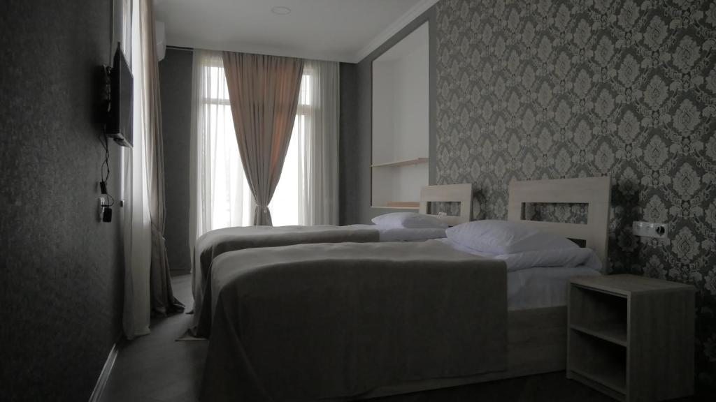 Двухместный (Двухместный номер с 2 отдельными кроватями, вид на сад) отеля Chateau ikalto, Икалто