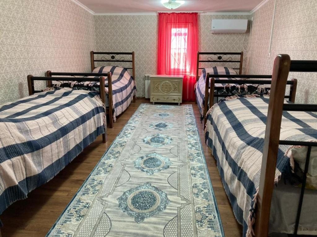 Номер (Кровать в общем номере для мужчин с 4 кроватями) хостела Adal Hostel, Шымкент