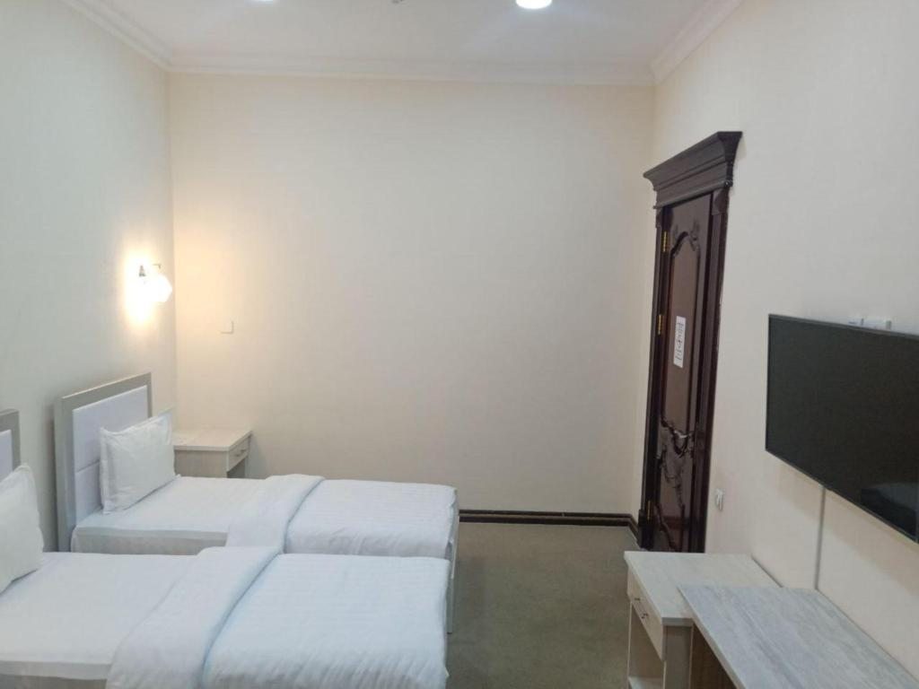 Двухместный (Двухместный номер с 2 отдельными кроватями) отеля Queens Hotel, Ташкент