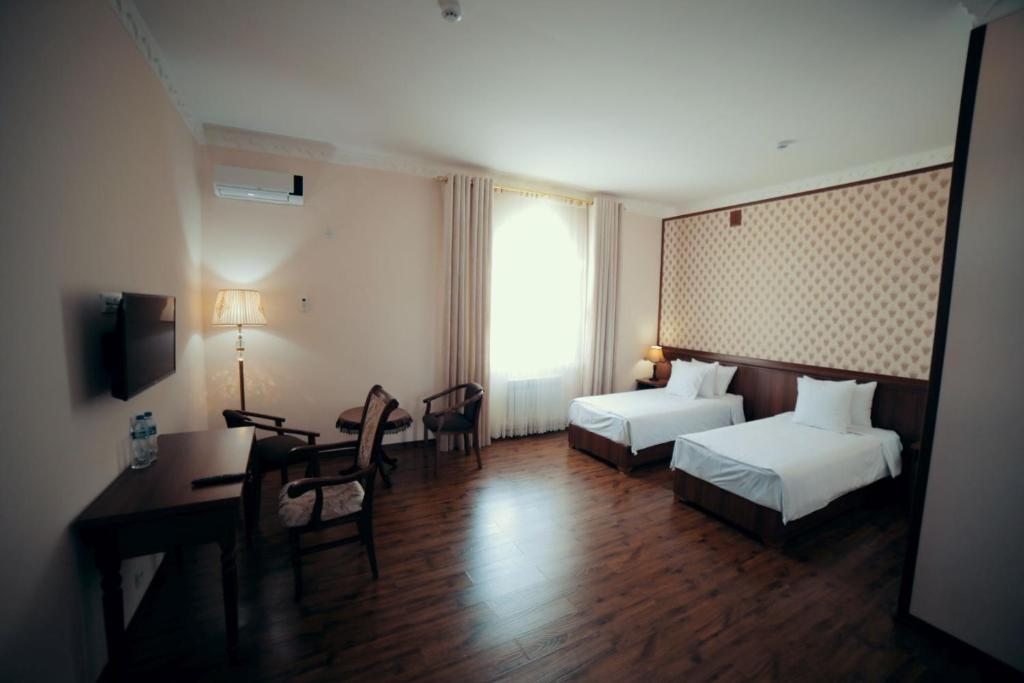 Двухместный (Двухместный номер с 1 кроватью или 2 отдельными кроватями) отеля Erkin Palace Hotel, Хива