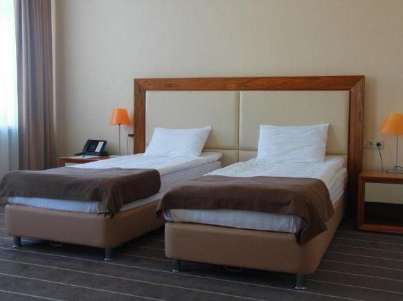 Фотография номера гостиницы Ост-Вест-Клаб