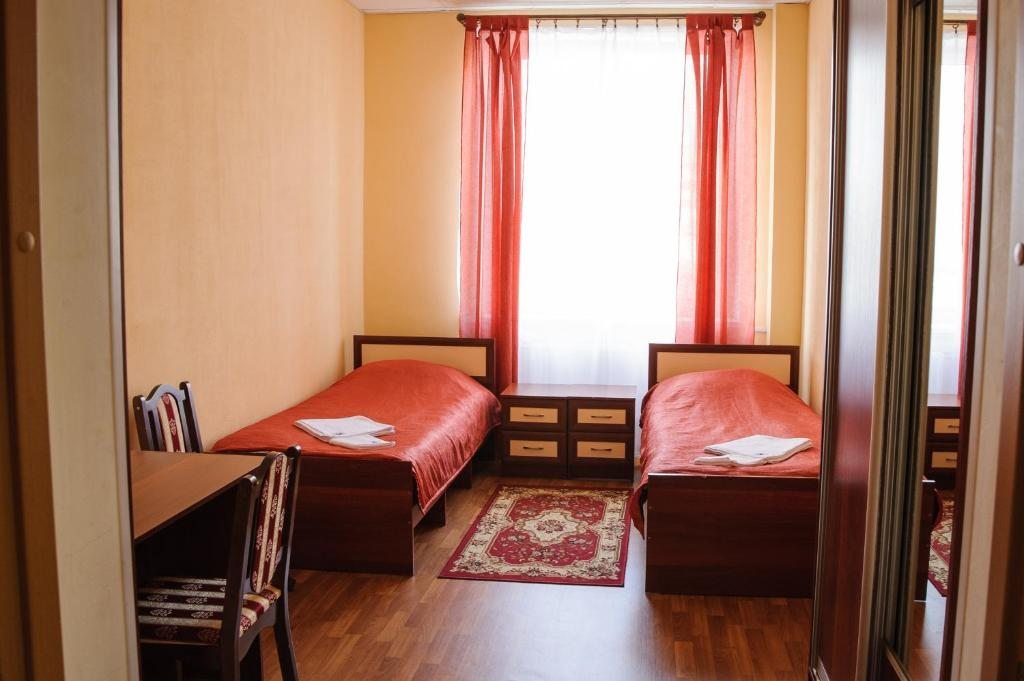 Двухместный (Бюджетный двухместный номер с 2 отдельными кроватями) мини-отеля ОРМАНД, Кингисепп