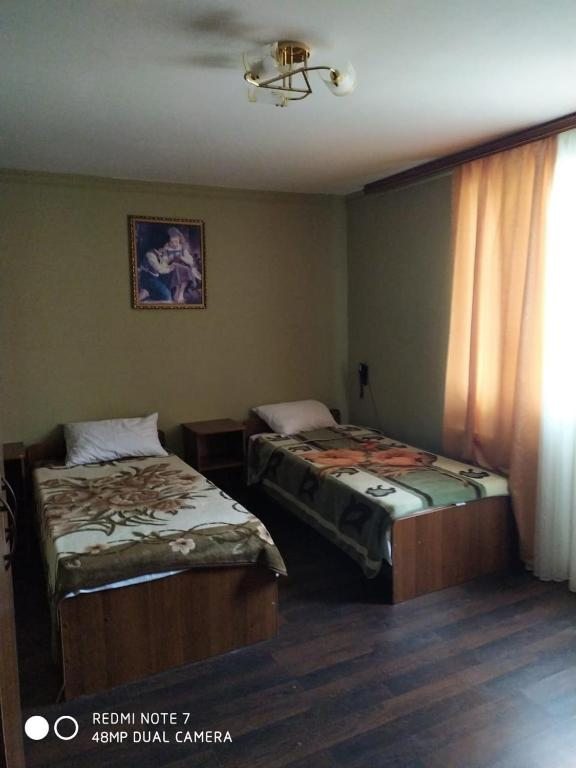 Двухместный (Бюджетный двухместный номер с 2 отдельными кроватями) отеля Гостиный двор, Дербент