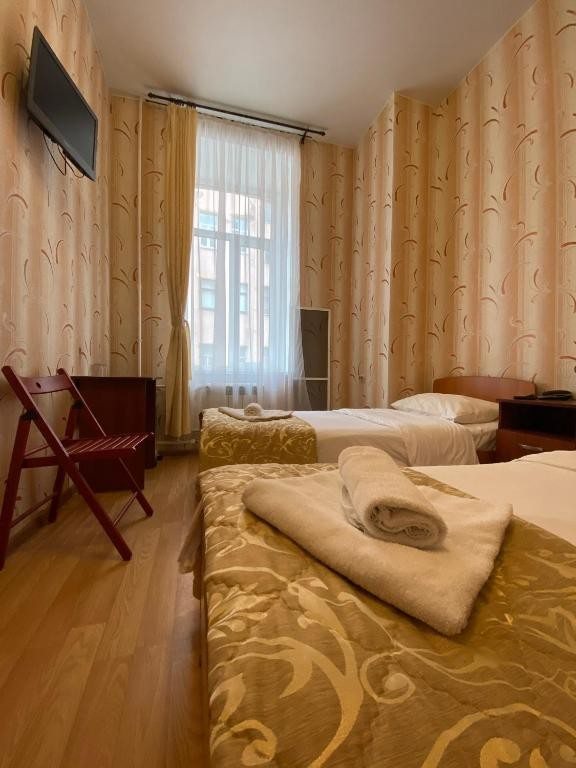 Двухместный (Стандартный двухместный номер с 2 отдельными кроватями) отеля Питер Хаус, Санкт-Петербург