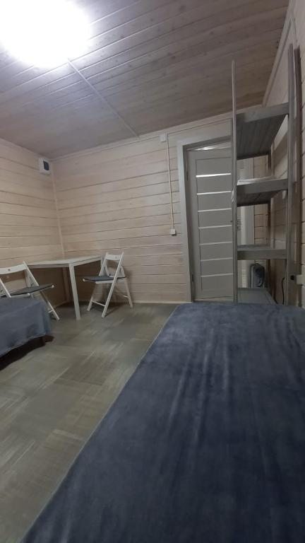 Двухместный (Стандартный двухместный номер с 2 отдельными кроватями и общей ванной комнатой) гостевого дома Baikal House, Хужир