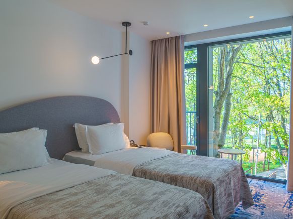 Фотография номера гостиницы Отель Карманнс Янтарь Холл