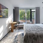 De Luxe (Семейный - двухместный номер с одной большой или двумя раздельными кроватями), Отель Karmann’s Hotel