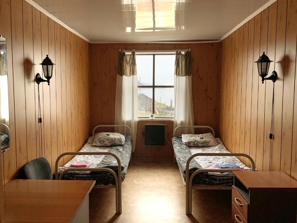 Двухместный (Бюджетный двухместный номер с 2 отдельными кроватями) отеля Норман, Териберка