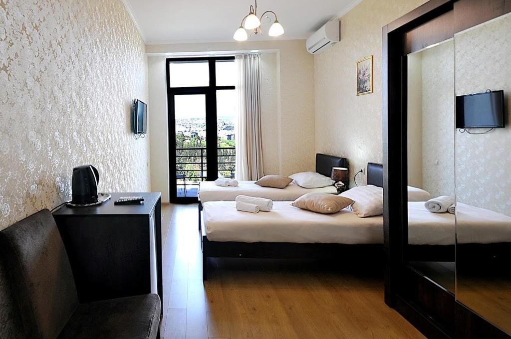 Двухместный (Двухместный номер с 2 отдельными кроватями и балконом) апартамента Apartament Tea, Тбилиси