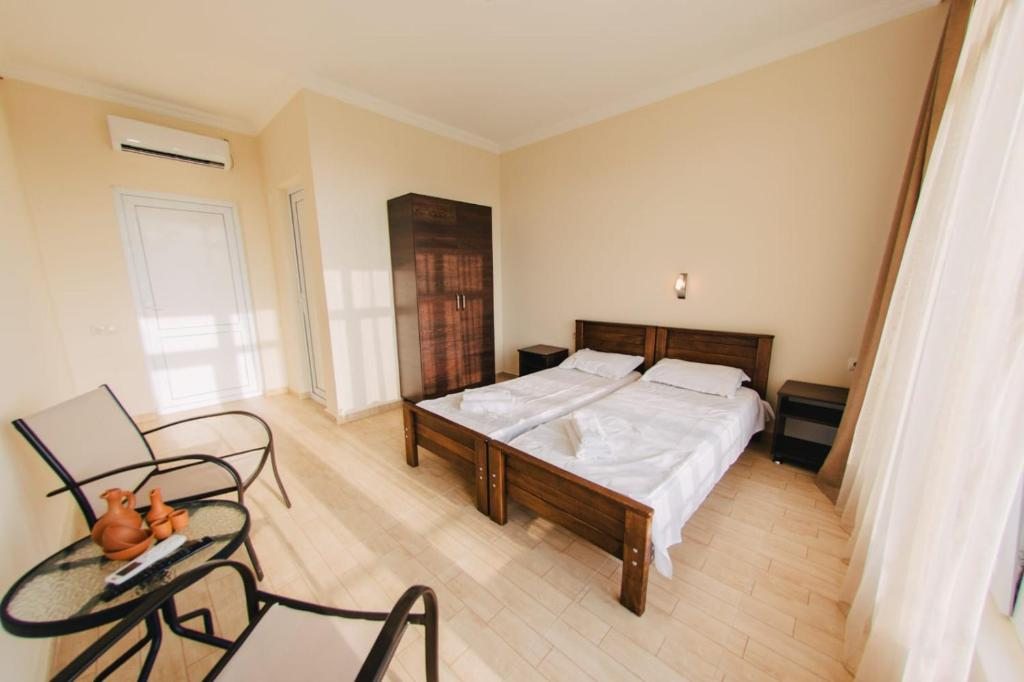 Двухместный (Двухместный номер с 2 отдельными кроватями и дополнительной кроватью) отеля sea-horizon, Кобулети