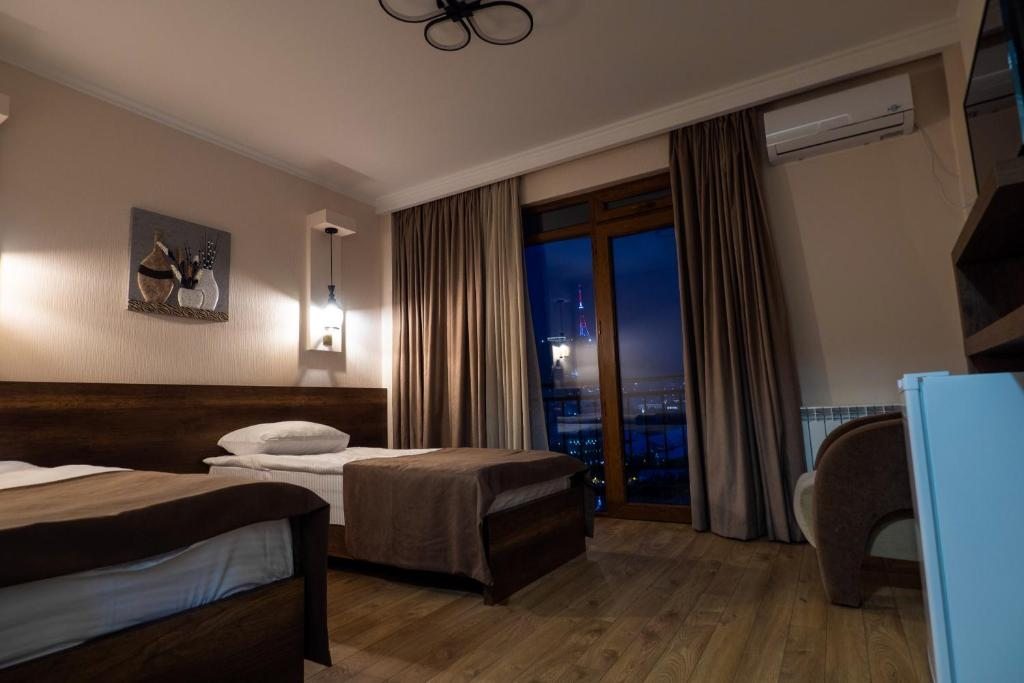 Двухместный (Двухместный номер Делюкс с 1 кроватью или 2 отдельными кроватями и балконом) отеля Hotel Livin, Тбилиси