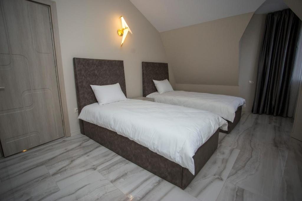 Двухместный (Двухместный номер с 2 отдельными кроватями) отеля Downtown Hotel, Батуми