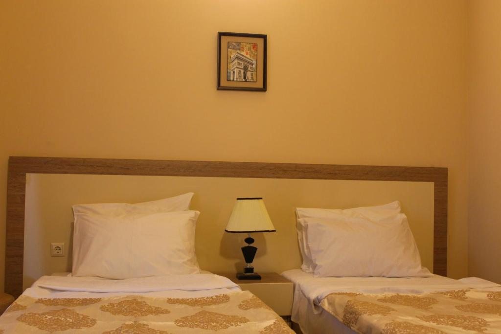 Двухместный (Небольшой двухместный номер с 2 отдельными кроватями) отеля Iveria Elli Hotel, Шекветили