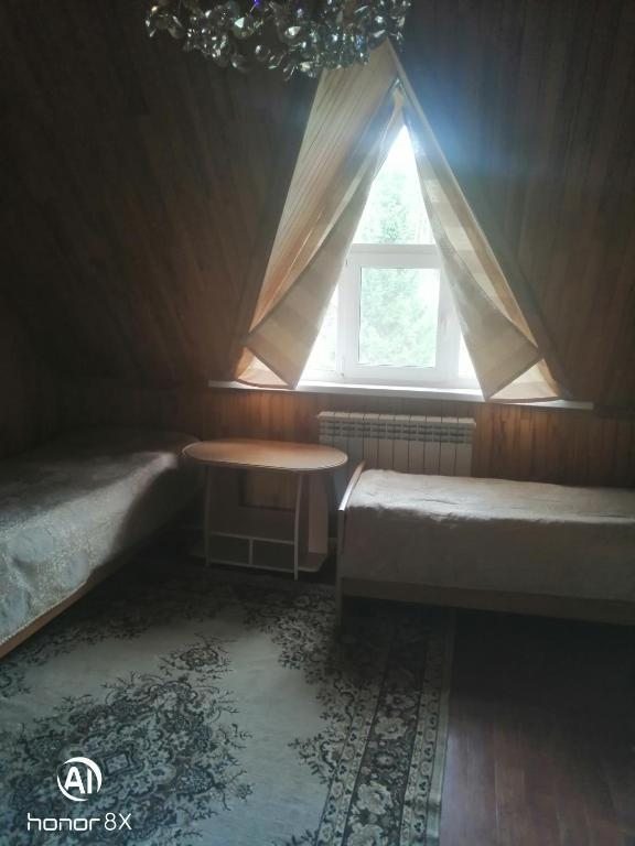 Двухместный (Двухместный номер с 2 отдельными кроватями и ванной комнатой) отеля Усадьба Эко-Релакс, Манжерок