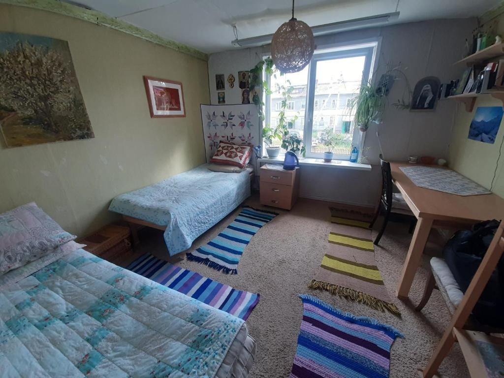 Двухместный (Бюджетный двухместный номер с 2 отдельными кроватями) гостевого дома MaHeya Mini Hostel, Соловецкий