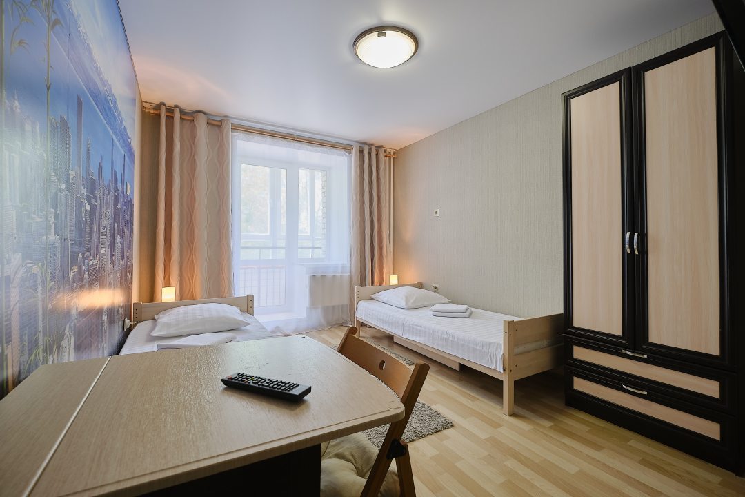 Двухместный (Двухместный номер с 2 отдельными кроватями и балконом №7) мини-отеля ОК! Hotel, Томск