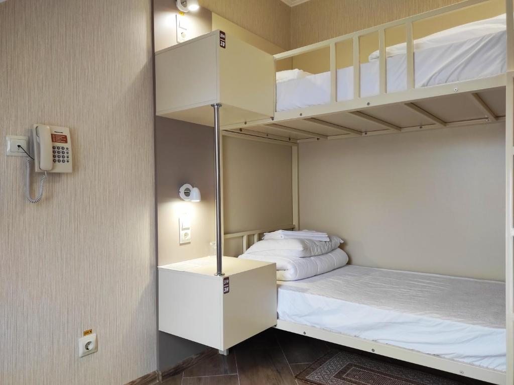 Номер (Спальное место на двухъярусной кровати в общем номере для мужчин) хостела Hostel TAPIAU, Гвардейск