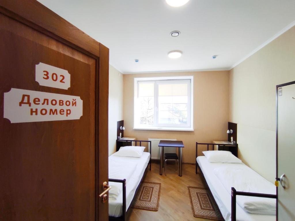 Двухместный (Двухместный номер с 2 отдельными кроватями) хостела Hostel TAPIAU, Гвардейск