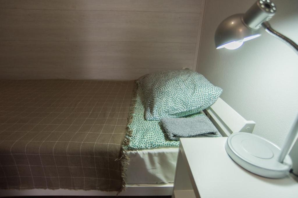 Номер (Односпальная кровать в общем номере для женщин) хостела Центральный хостел, Вологда