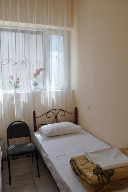 Двухместный (Стандартный двухместный номер с 2 отдельными кроватями) хостела Hostel - NS Prestige, Шымкент