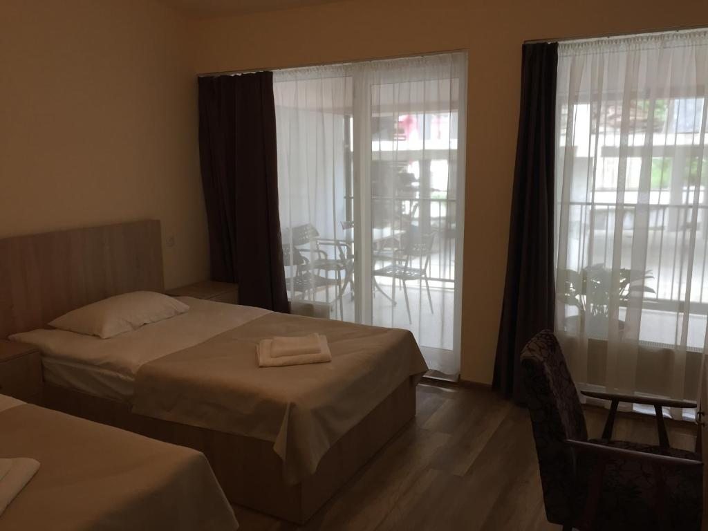 Двухместный (Двухместный номер с 2 отдельными кроватями и террасой) отеля R and B, Боржоми