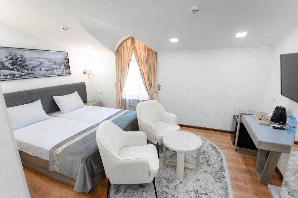 Двухместный (Двухместный номер Делюкс с 1 кроватью или 2 отдельными кроватями) отеля Registon Saroy Hotel, Самарканд