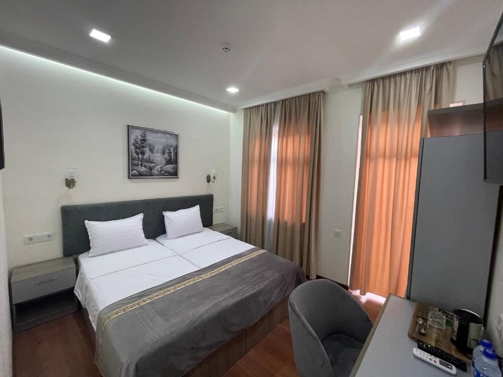Двухместный (Стандартный двухместный номер с 1 кроватью или 2 отдельными кроватями) отеля Registon Saroy Hotel, Самарканд