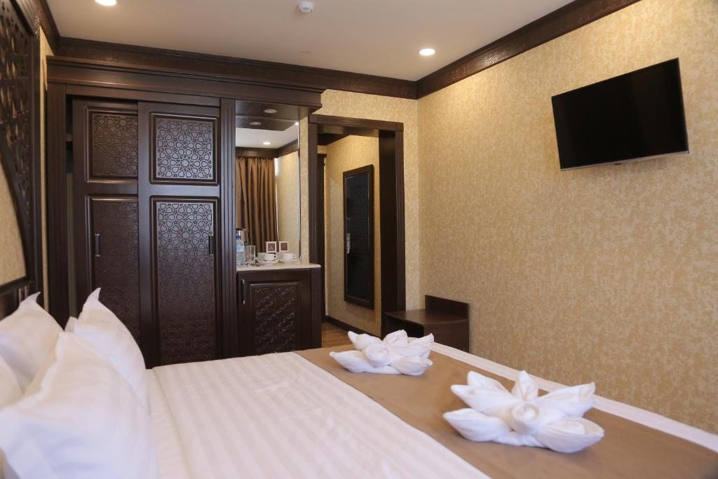Двухместный (Двухместный номер с 1 кроватью и балконом) отеля Orient Star Varaxsha, Бухара